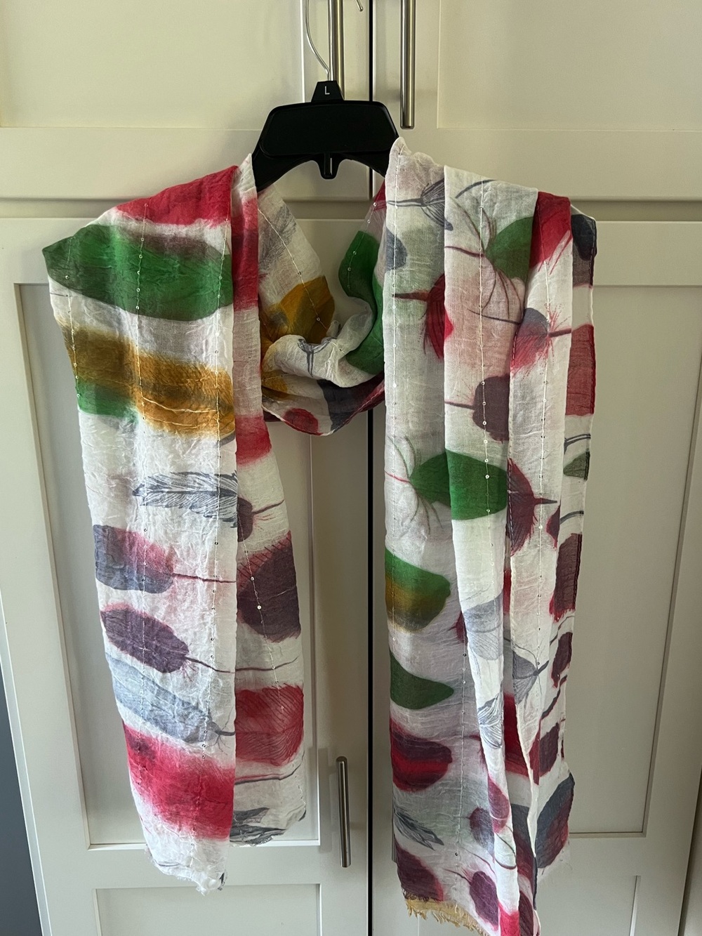 Multi colored scarf with feathers